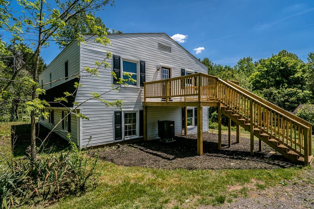 660 Tryme Road Reva, VA 22735 - Photo 1 of 40 a view of a house with a yard