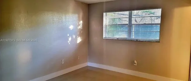 a view of a small space with a window