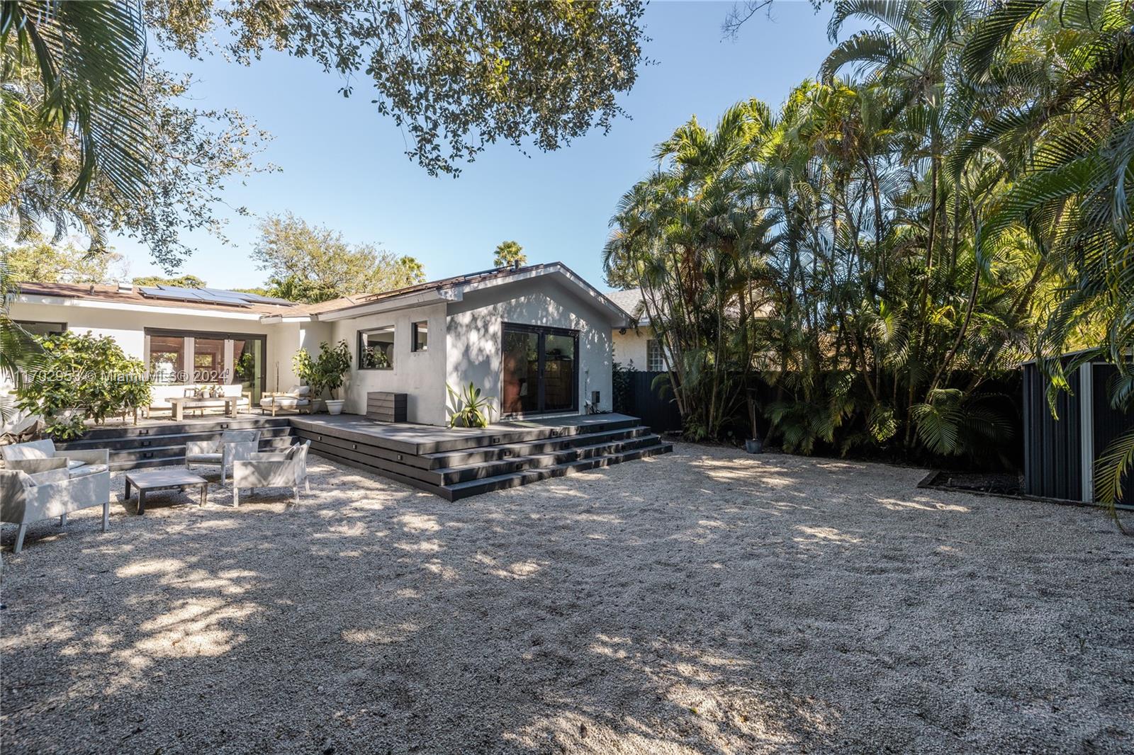 56 Northeast 46th Street Miami, FL 33137 - Photo 23 of 28 a view of a house with a patio