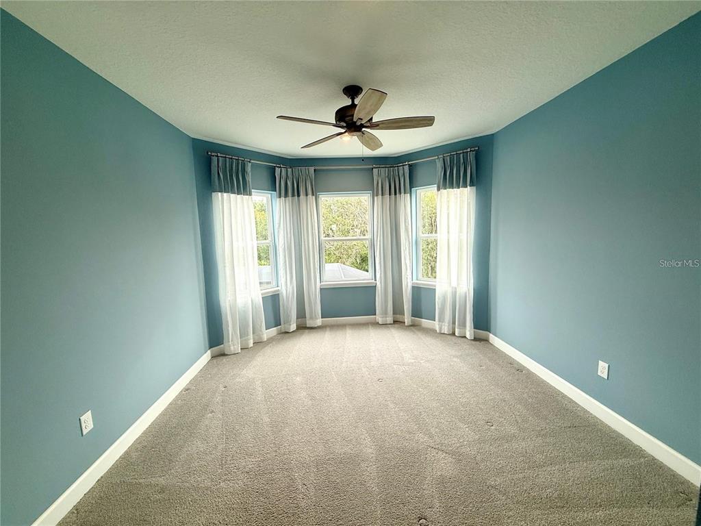 5967 Maidenstone Way Palmetto, FL 34221 - Photo 18 of 28 a view of an empty room with a window