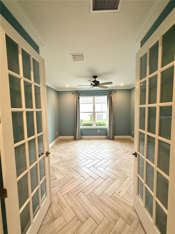 5967 Maidenstone Way Palmetto, FL 34221 - Photo 4 of 28 a view of an empty room with a window