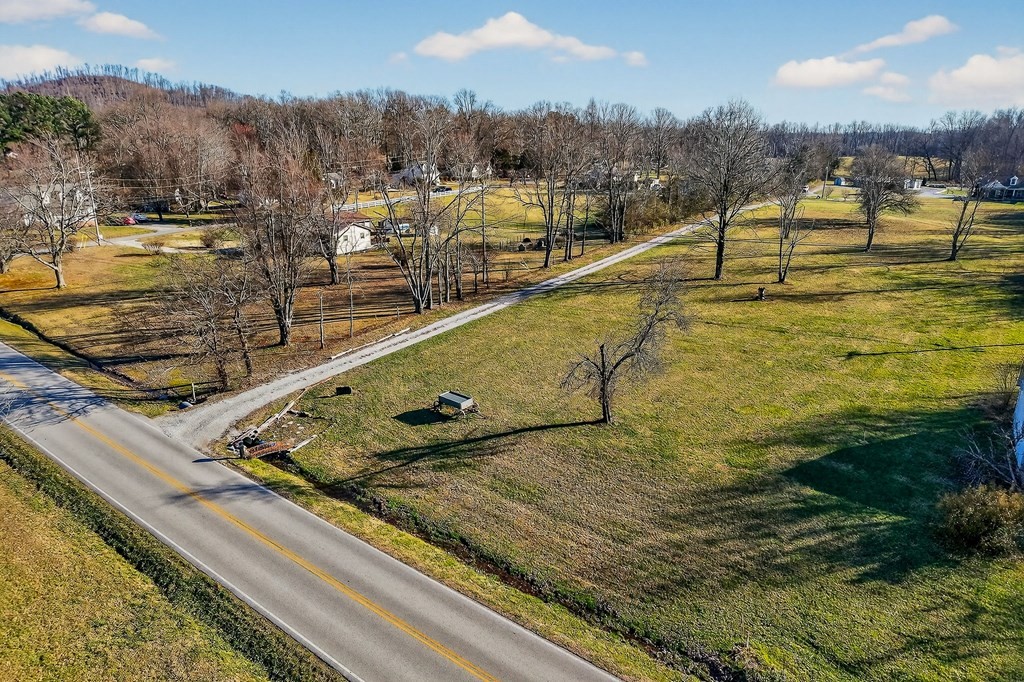 6081 Buck Mountain Road Cookeville, TN 38506 - Photo 69 of 71 a view of a swimming pool with a table and chairs