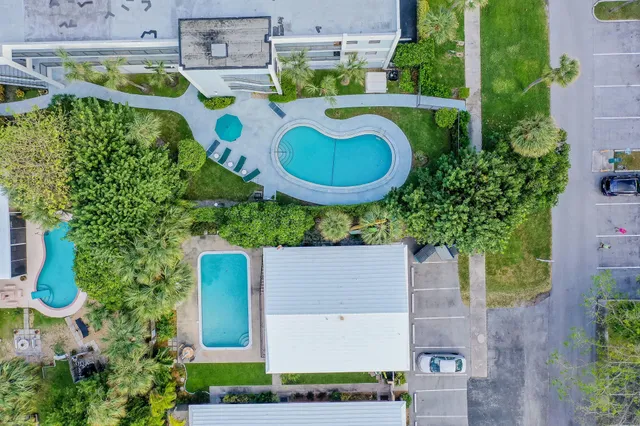a couple of bicycles parked next to a house