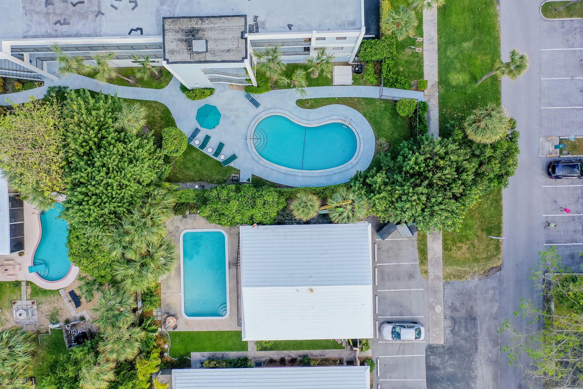 2031 Southeast 5th Street, Unit 8 Deerfield Beach, FL 33441 - Photo 11 of 13 an aerial view of a house with outdoor space