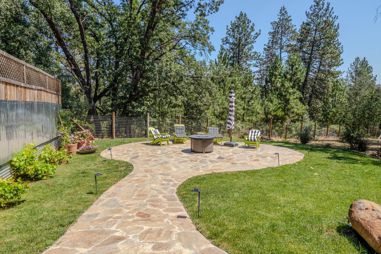 27689 Table Meadow Road Auburn, CA 95602 - Photo 47 of 72 a view of a backyard with sitting area
