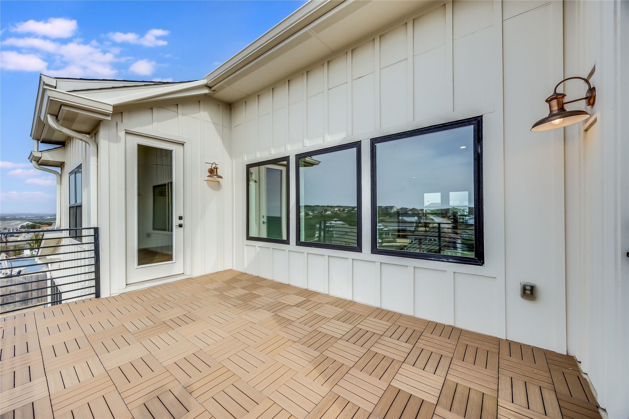288 Smoke Tree Circle Dripping Springs, TX 78620 - Photo 28 of 40 a view of a house with a balcony