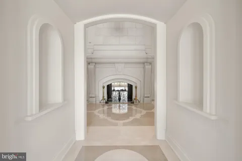 a kitchen with stainless steel appliances kitchen island granite countertop a stove and a refrigerator