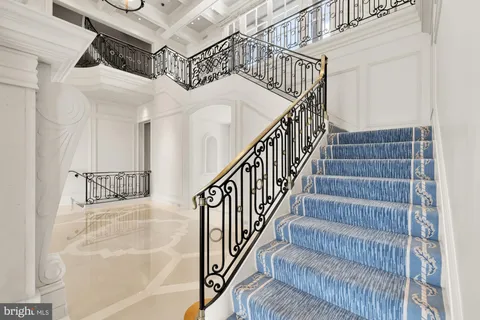 a view of a balcony with staircase