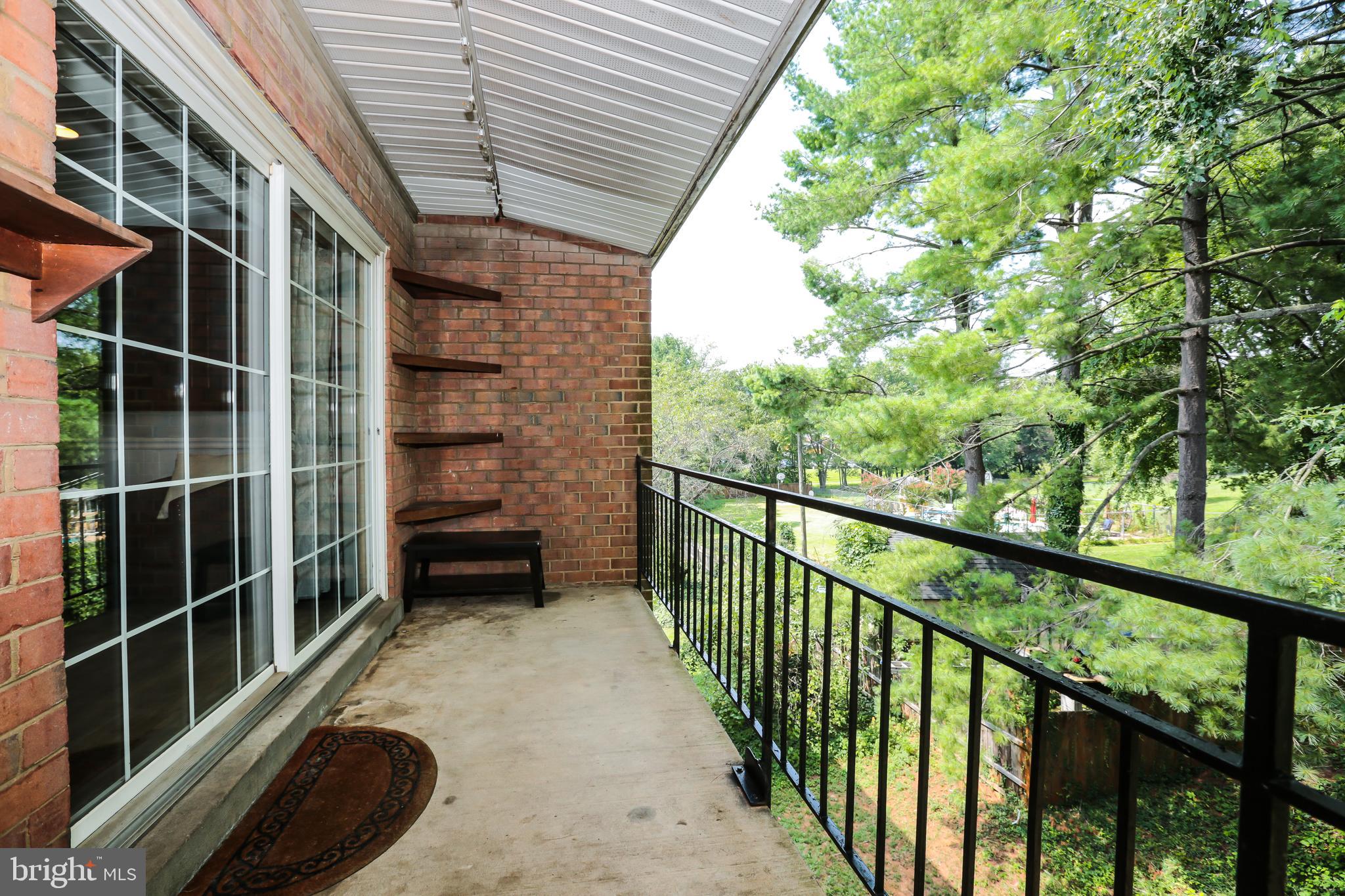 635 Waterloo Road, Unit 233 Warrenton, VA 20186 - Photo 17 of 19 Balcony Deck w/ Scenic Views