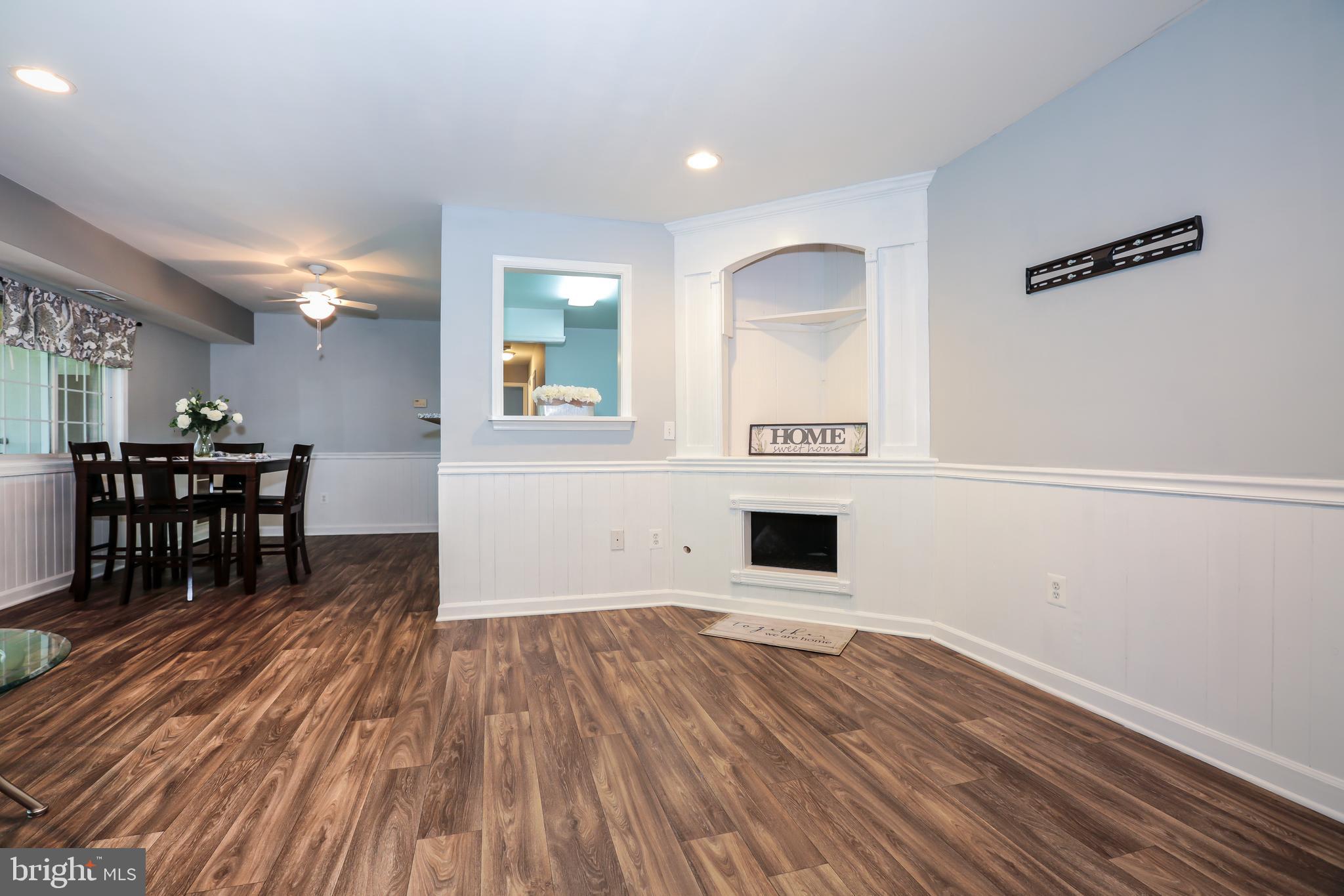 635 Waterloo Road, Unit 233 Warrenton, VA 20186 - Photo 3 of 19 Huge Living Room with Wainscoting Trim Package