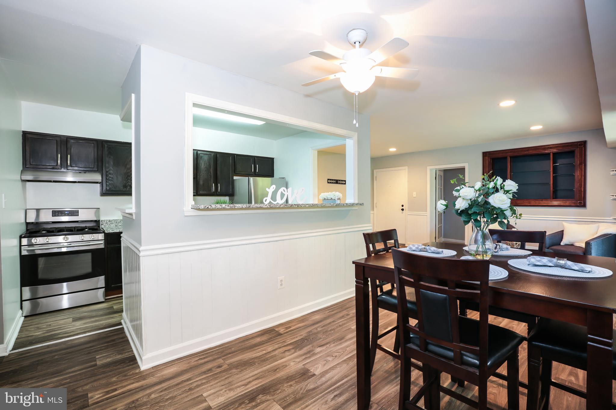 635 Waterloo Road, Unit 233 Warrenton, VA 20186 - Photo 6 of 19 Open Floor with Kitchen Connecting to Dining Room