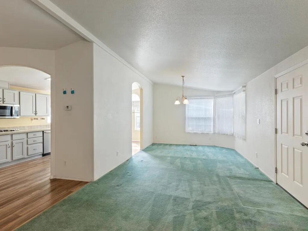 9500 Harritt Road, Unit 31 Lakeside, CA 92040 - Photo 13 of 33 a view of a big room with windows and cabinet