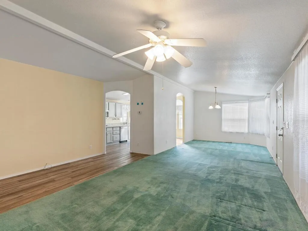 9500 Harritt Road, Unit 31 Lakeside, CA 92040 - Photo 16 of 33 an empty room with fan and entrance