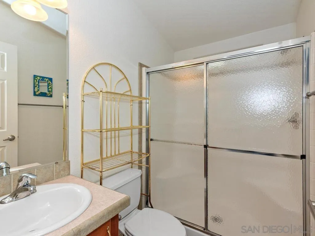9500 Harritt Road, Unit 31 Lakeside, CA 92040 - Photo 19 of 33 a bathroom with a sink toilet and shower