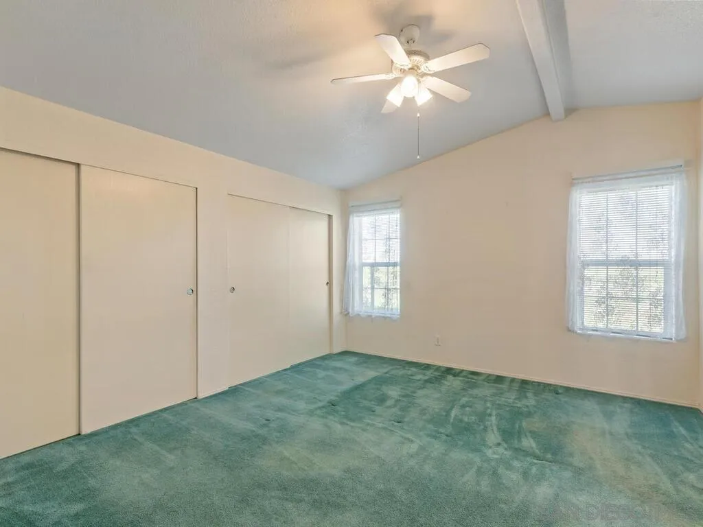 9500 Harritt Road, Unit 31 Lakeside, CA 92040 - Photo 26 of 33 wooden floor in an empty room with a window