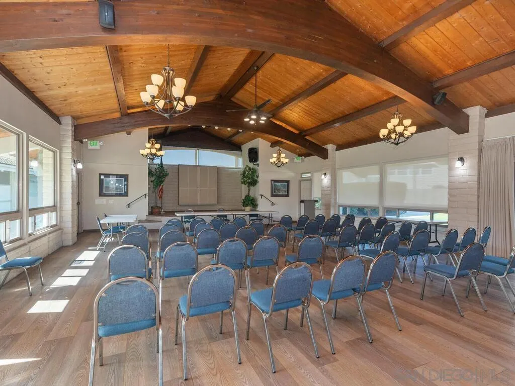9500 Harritt Road, Unit 31 Lakeside, CA 92040 - Photo 31 of 33 a living room with lots of furniture and a chandelier
