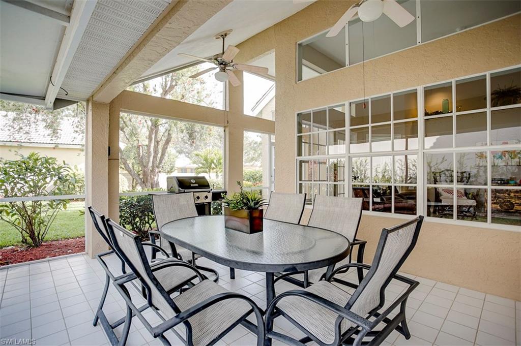 168 Napa Ridge Way Naples, FL 34119 - Photo 19 of 22 a view of a dining room with furniture window and outside view