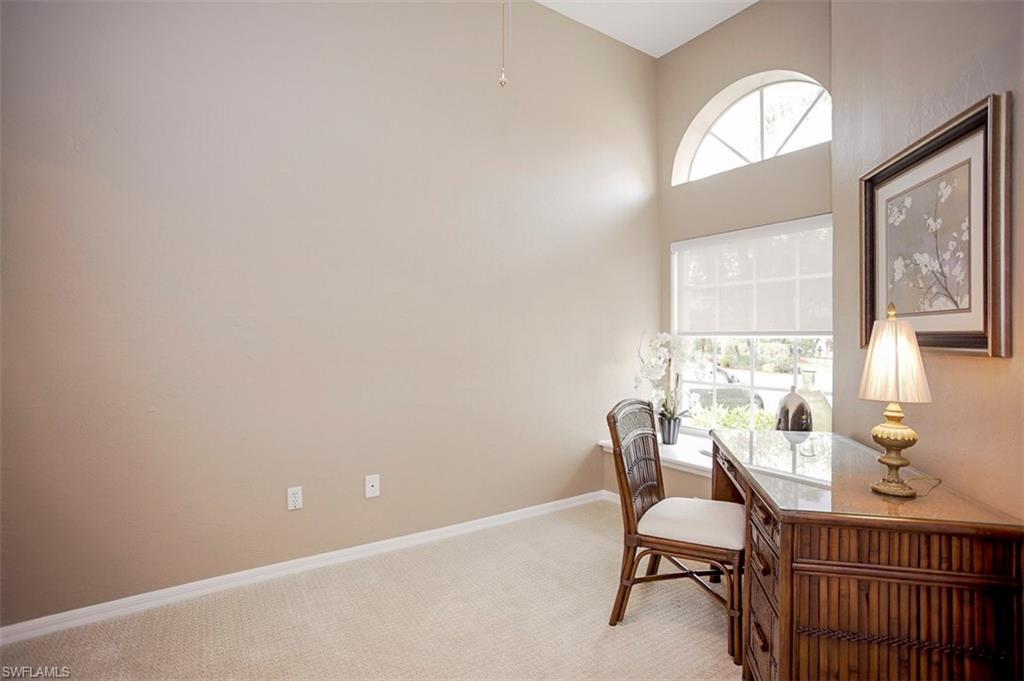168 Napa Ridge Way Naples, FL 34119 - Photo 5 of 22 a view of a dining room with furniture and a window