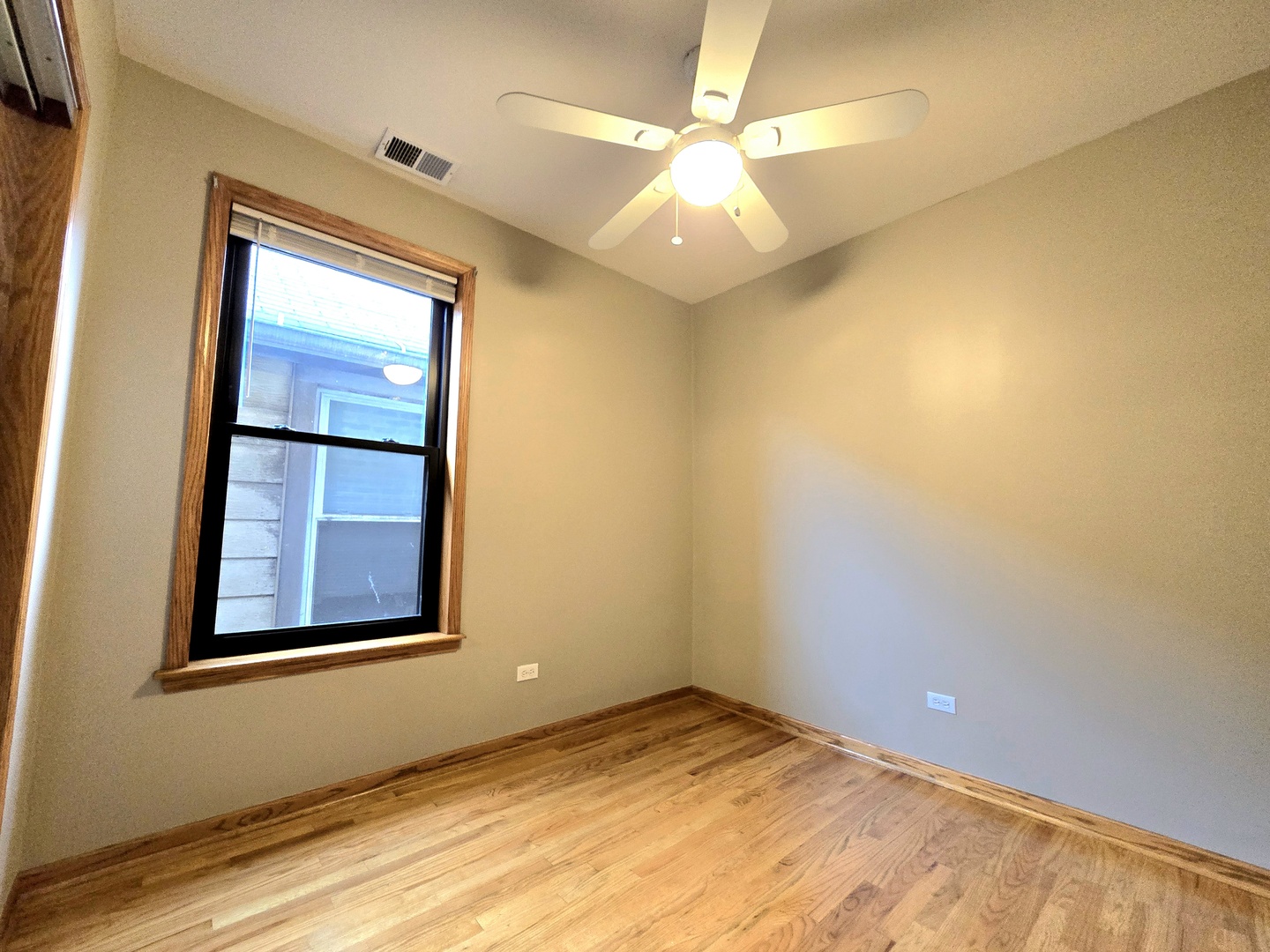 2126 West 24th Street, Unit 2 Chicago, IL 60608 - Photo 7 of 16 a view of an empty room