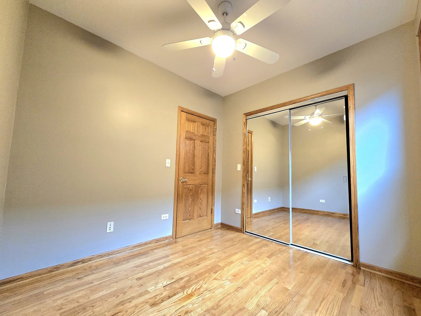 2126 West 24th Street, Unit 2 Chicago, IL 60608 - Photo 8 of 16 a view of an empty room with glass door