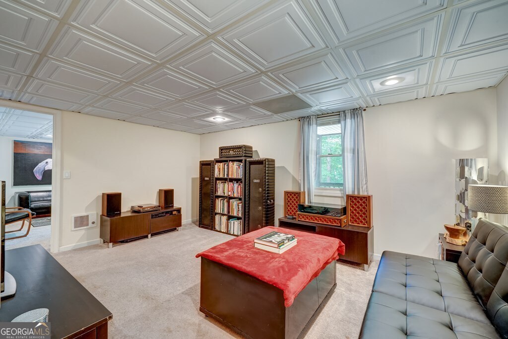 154 Rhapsody Circle Ellijay, GA 30540 - Photo 32 of 64 a reading room with furniture and book shelf