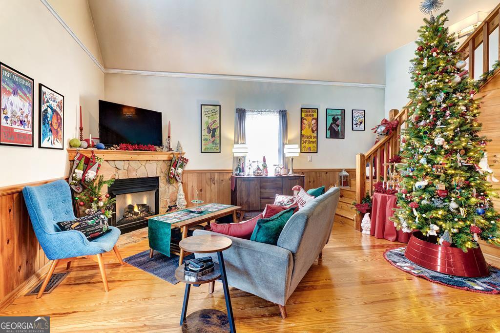 154 Rhapsody Circle Ellijay, GA 30540 - Photo 5 of 64 a living room with fireplace furniture and a flat screen tv