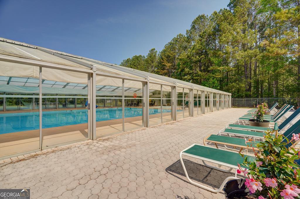 154 Rhapsody Circle Ellijay, GA 30540 - Photo 64 of 64 a view of a house with a backyard