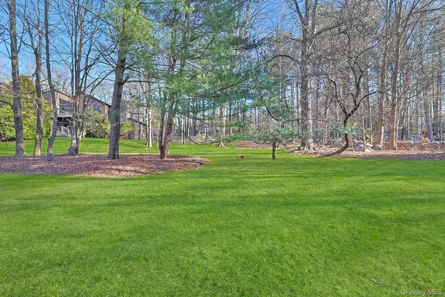 a building with trees in the background
