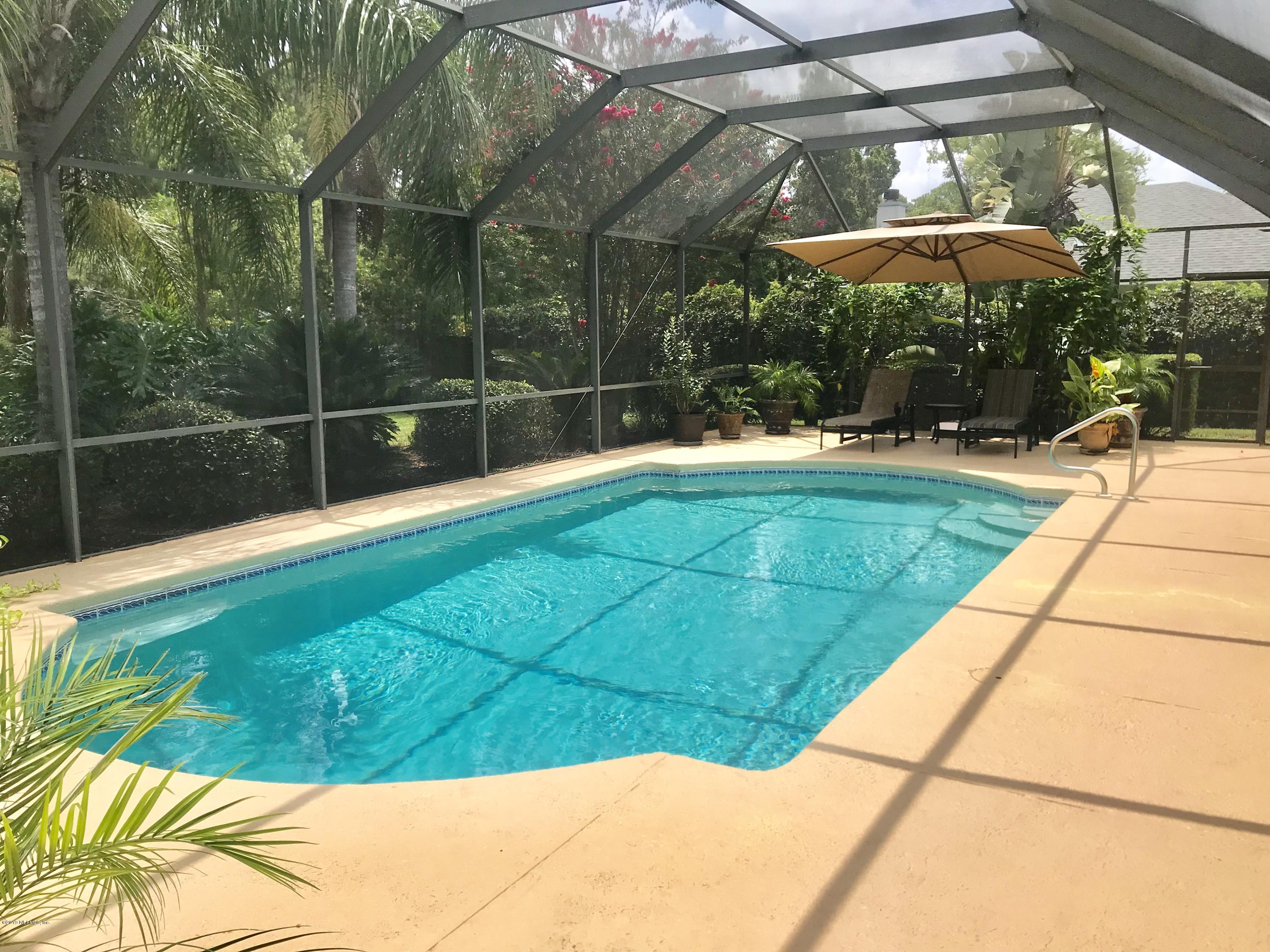 5030 Datil Pepper Road St. Augustine, FL 32086 - Photo 6 of 52 a view of a backyard