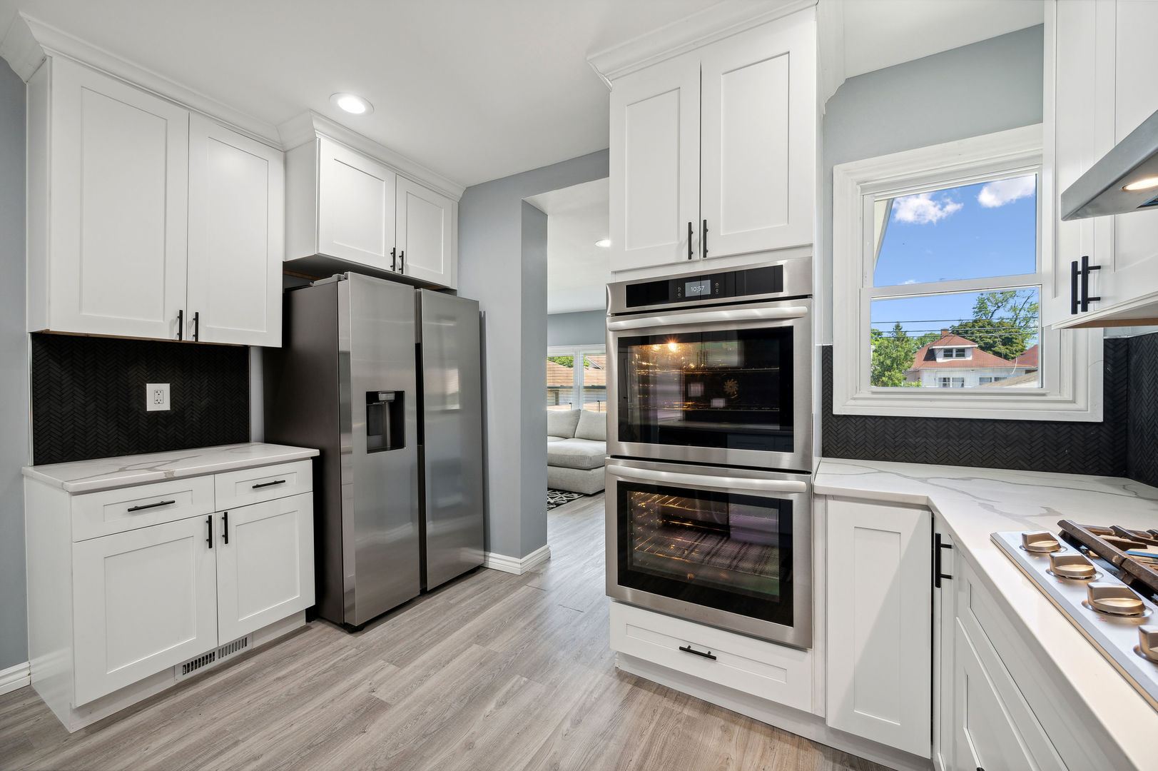 4630 West Montana Street Chicago, IL 60639 - Photo 11 of 38 a kitchen with stainless steel appliances a stove a microwave and a refrigerator