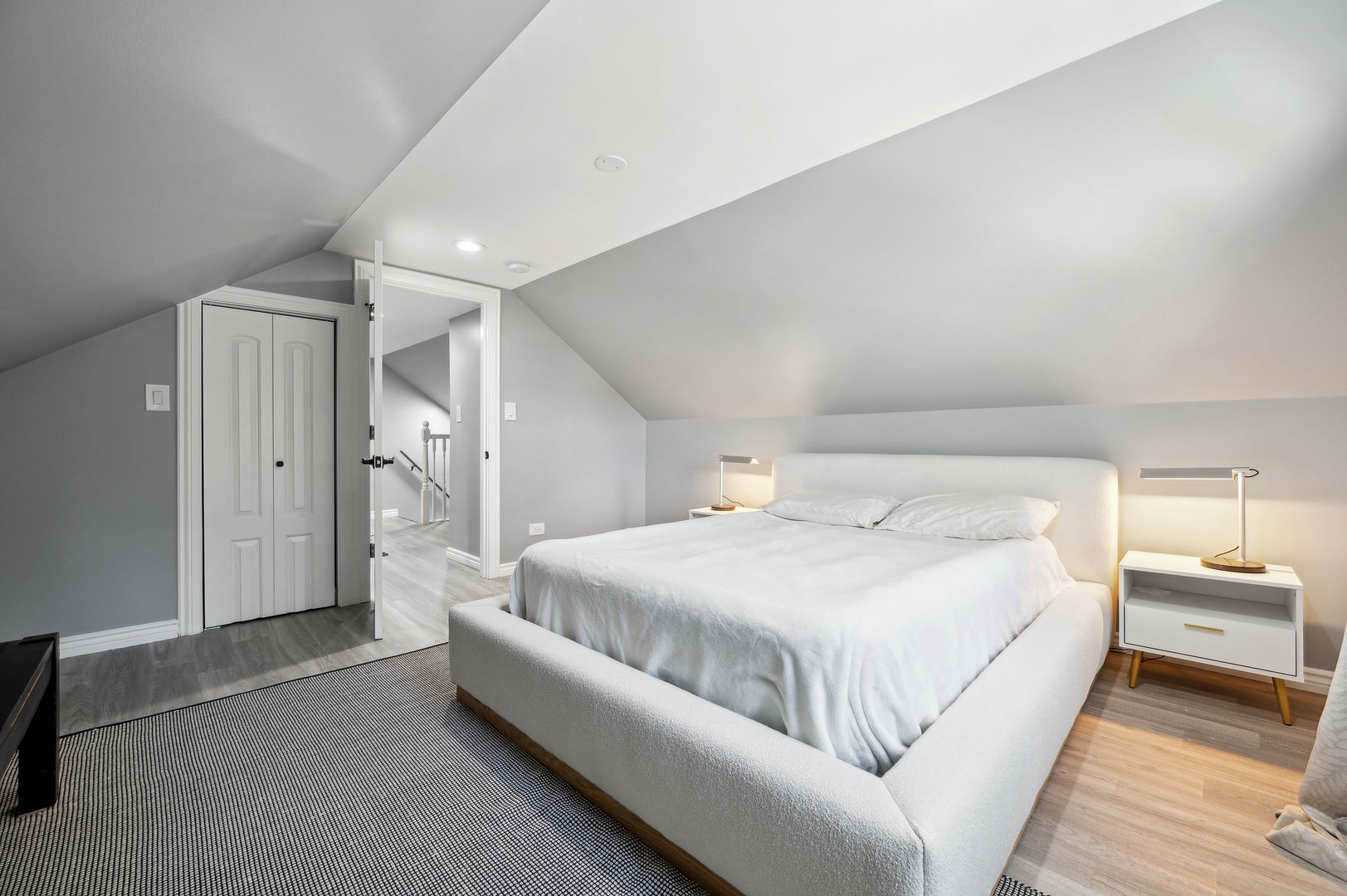 4630 West Montana Street Chicago, IL 60639 - Photo 21 of 38 a spacious bedroom with a bed and a walk in closet