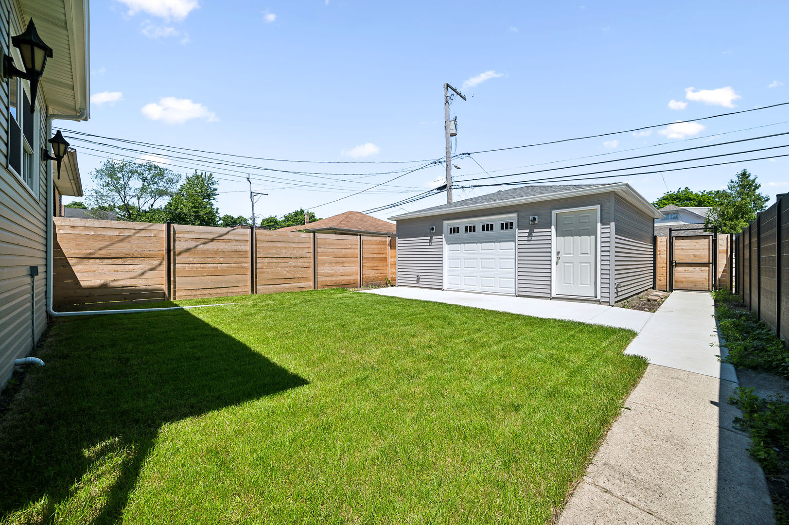 4630 West Montana Street Chicago, IL 60639 - Photo 31 of 38 a view of a porch with a backyard