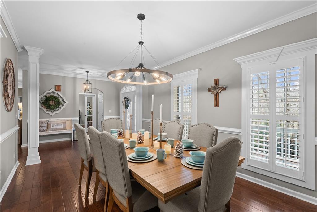 414 Parker Branch Road Barnesville, GA 30204 - Photo 15 of 101 a view of a dining room with furniture wooden floor and chandelier