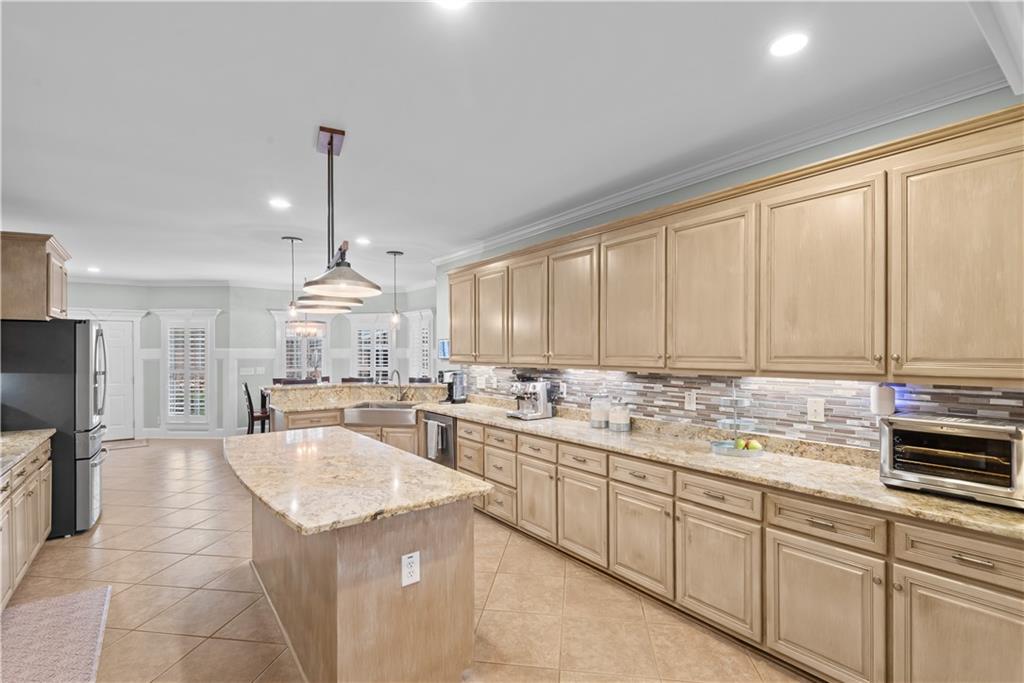 414 Parker Branch Road Barnesville, GA 30204 - Photo 20 of 101 a kitchen with a sink stove and cabinets