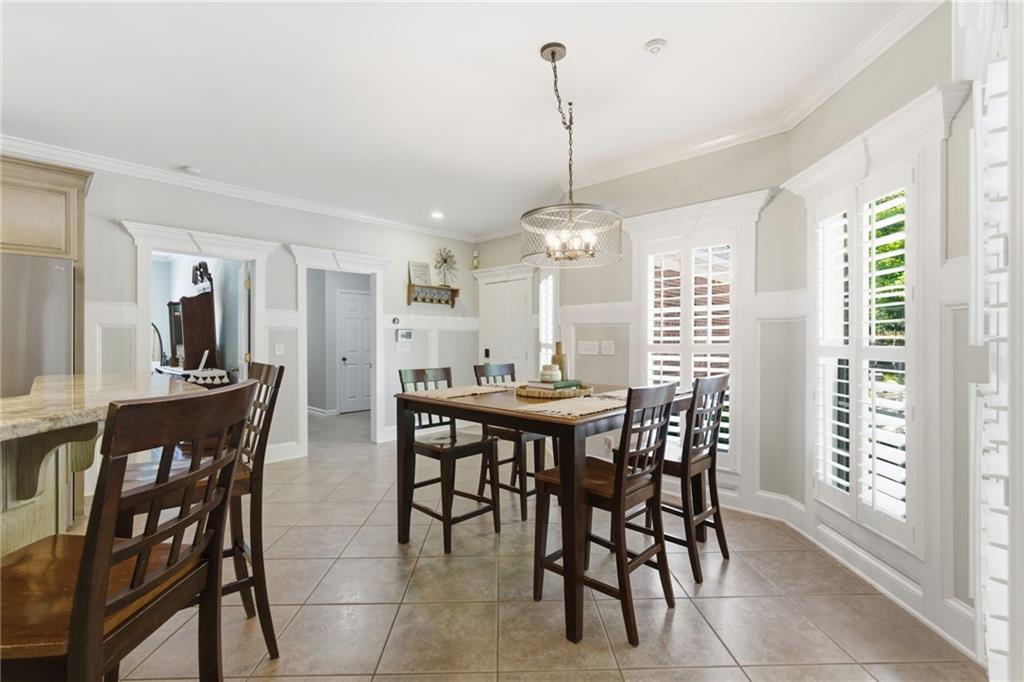414 Parker Branch Road Barnesville, GA 30204 - Photo 24 of 83 a view of a a dining room with furniture window and wooden floor