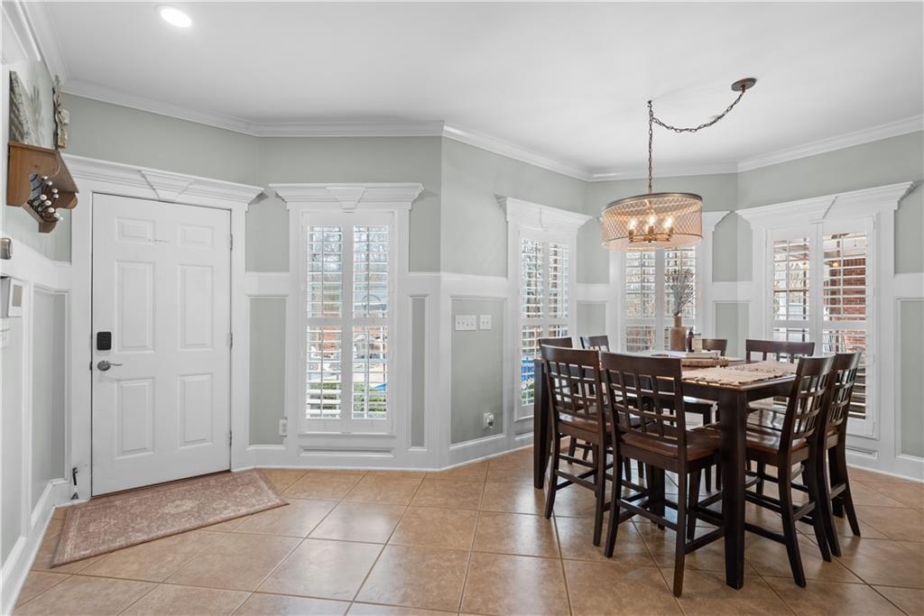 414 Parker Branch Road Barnesville, GA 30204 - Photo 25 of 101 a view of a dining room with furniture window and wooden floor