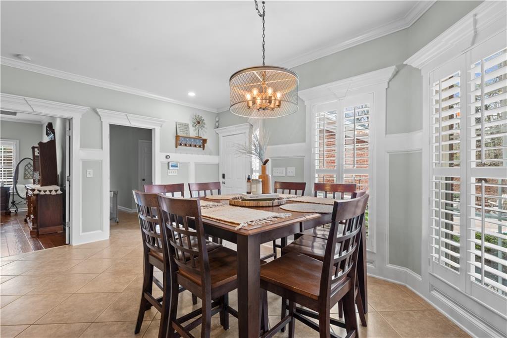 414 Parker Branch Road Barnesville, GA 30204 - Photo 26 of 101 a view of a dining room with furniture window and wooden floor