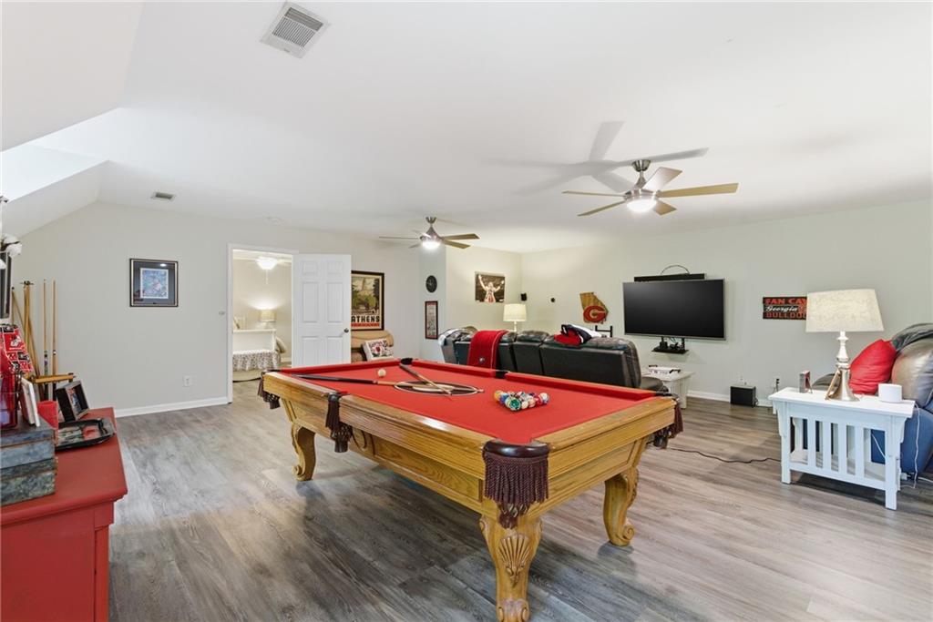 414 Parker Branch Road Barnesville, GA 30204 - Photo 39 of 83 a room with furniture pool table flat screen tv and windows