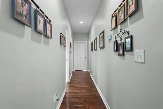a swimming pool with trees in the background