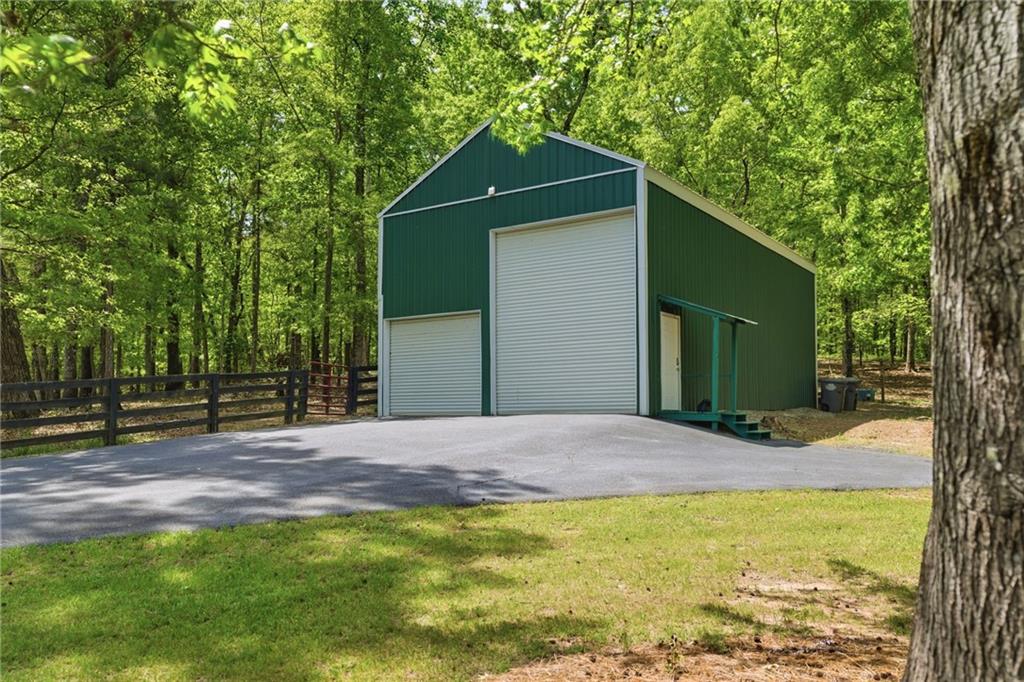 414 Parker Branch Road Barnesville, GA 30204 - Photo 57 of 83 a front view of a house with a yard