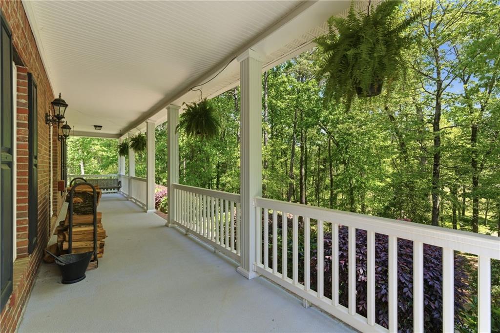 414 Parker Branch Road Barnesville, GA 30204 - Photo 7 of 83 a view of a porch with furniture
