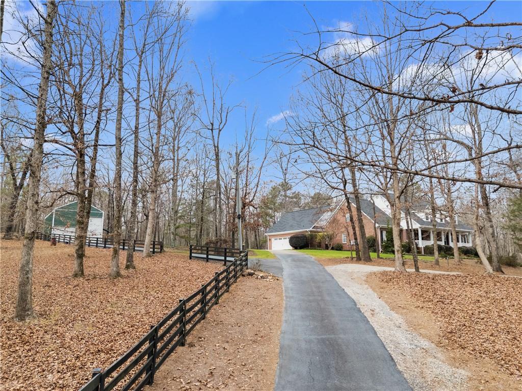 414 Parker Branch Road Barnesville, GA 30204 - Photo 87 of 101 a view of road with snow on the road