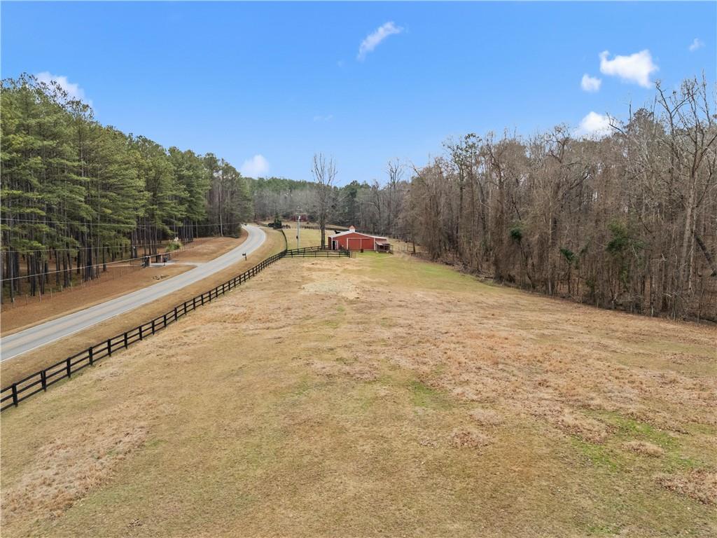 414 Parker Branch Road Barnesville, GA 30204 - Photo 97 of 101 a swimming pool with trees in the background