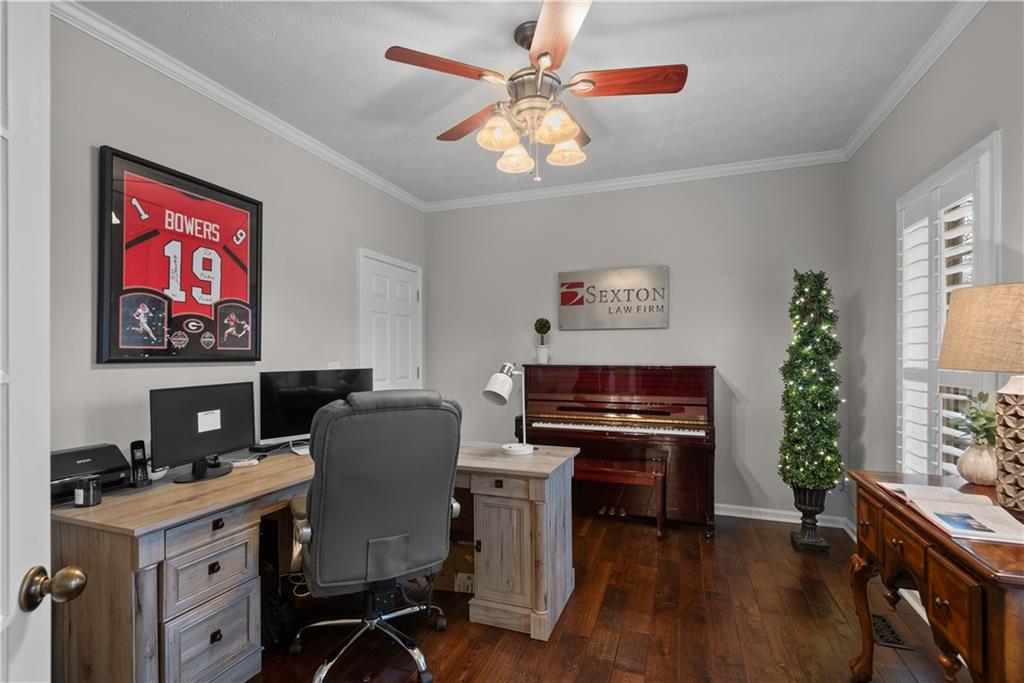 414 Parker Branch Road Barnesville, GA 30204 - Photo 10 of 101 a work room with furniture and a flat screen tv