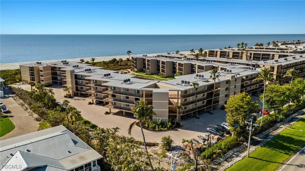 an aerial view of a building with outdoor space