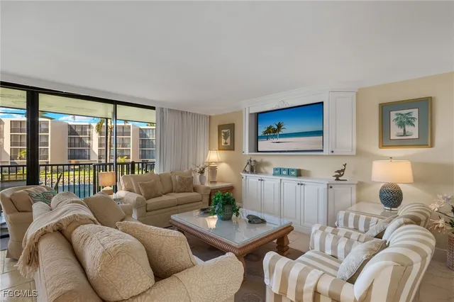 a living room with furniture and a couch