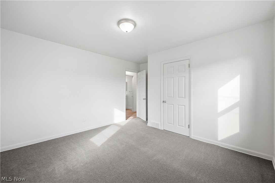 227 Wilson Street Struthers, OH 44471 - Photo 18 of 44 Unfurnished bedroom featuring baseboards and carpet