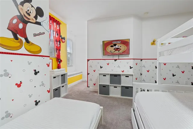 a bedroom with furniture and a bed