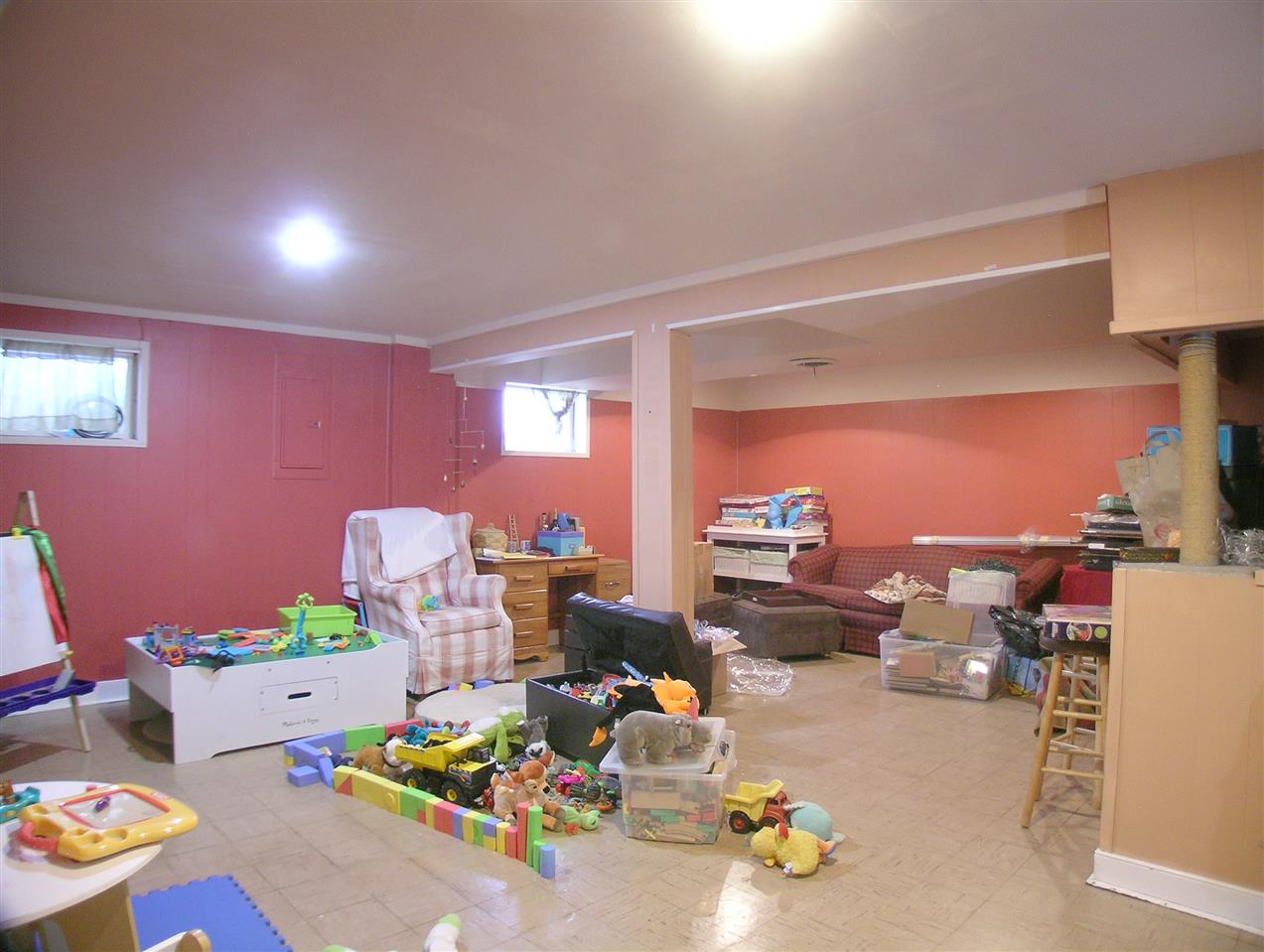 1244 Holmes Avenue Charlottesville, VA 22901 - Photo 14 of 19 a living room with furniture and a couch