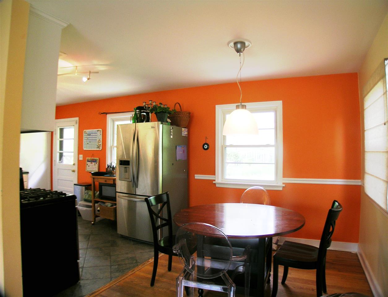 1244 Holmes Avenue Charlottesville, VA 22901 - Photo 6 of 19 a view of a dining room with furniture and a window